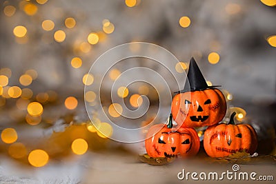 Three spooky orange pumpkins. Closeup Stock Photo