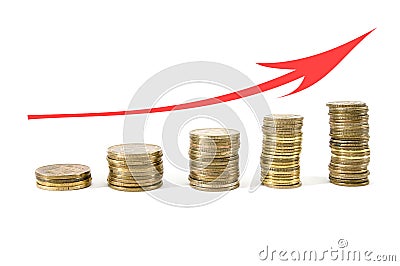 Three stacks of coins grow up on a white background. Business concept. Ukrainian pennies. The red arrow shows revenue growth. Stock Photo