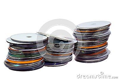 Three Stacks of Colorful Compact Discs on White Stock Photo