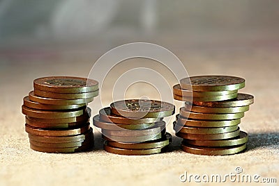 Three stacks of metal coins Stock Photo