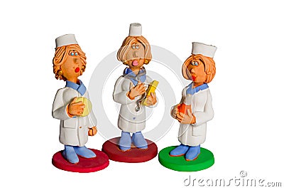 Three statues of women doctors Stock Photo