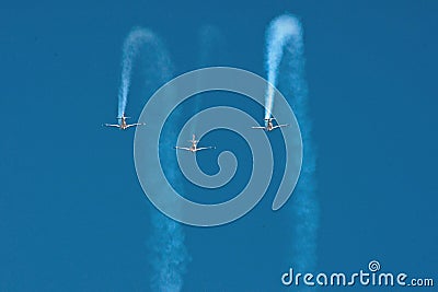 Three stunt planes flying in formation towards camera Editorial Stock Photo