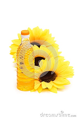 Three sunflowers and bottle Stock Photo