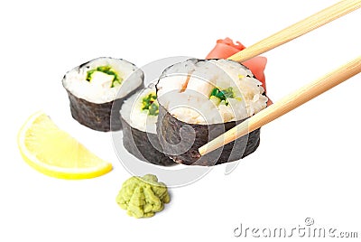 Three sushi, wasabi, gringer, lemon and sticks Stock Photo