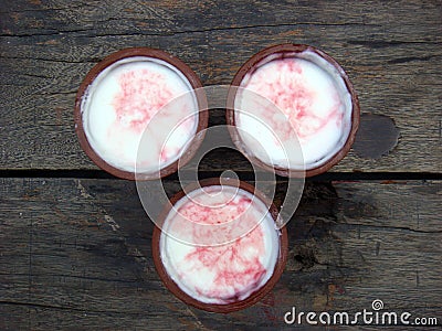 Three sweet lassi on wooden board Stock Photo