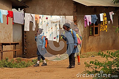 Three Tanzanian School Girls and a Popsicle Editorial Stock Photo