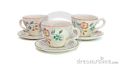 Three tea cups with saucers isolated Stock Photo