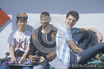 Three teenage boys posing for a picture at the Dairy Queen,Otis, OR Editorial Stock Photo