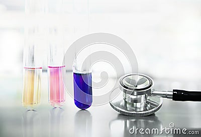 Three test tube with stethoscope for medical doctor check up in Stock Photo