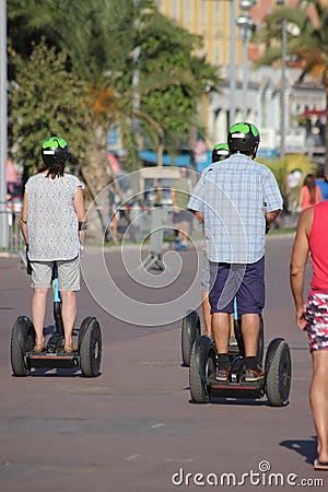 Three tourists on a Segway in Nice, France Editorial Stock Photo