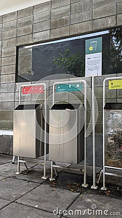 three trash cans. with their respective uses Stock Photo