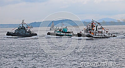Three tugboats racing Editorial Stock Photo
