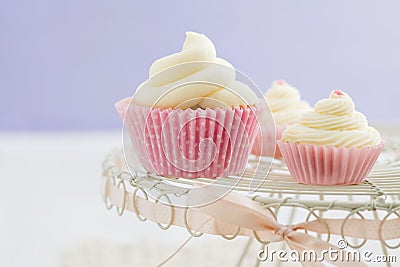 Three vanilla cupcakes Stock Photo