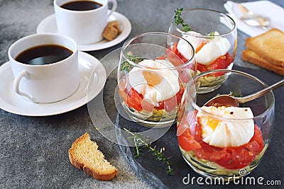 Three verrines breakfast. Poached eggs, tomatoes, zucchini and caps of coffee Stock Photo