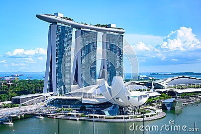 Marina Bay Sands Hotel, Singapore. Three vertical buildings carry a surfboard on top. Luxury Hotel, ArtSience Museum Editorial Stock Photo
