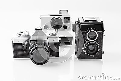 Three vintage analogue cameras Stock Photo