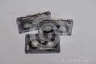 Three vintage used music cassettes plastic bands Editorial Stock Photo