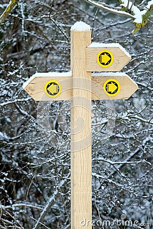 Snow covered signpost Stock Photo