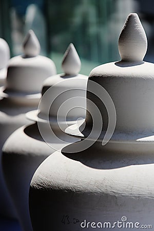 Three white ceramic jars Stock Photo