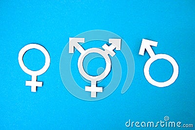 Three white symbols for gender on blue background. concept transgender Stock Photo