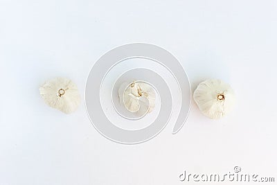 three whole raw garlic. Minimalist photo of raw garlic. Ingredients photo concept Stock Photo