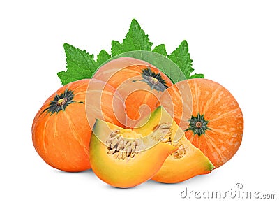 Three whole and slice pumpkin with green leaves Stock Photo