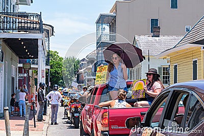 Three women in truck bed holding signs in Trans Black Lives Matter demonstration in French Quarter Editorial Stock Photo