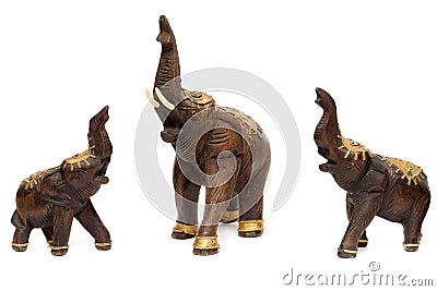 Three wooden statues of elephants Stock Photo