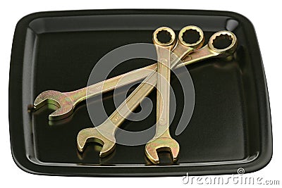 Three wrenches on a tray Stock Photo