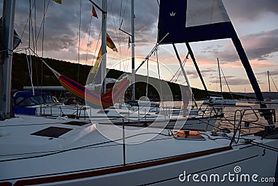 Three yachts anchoring in bay at sunset Editorial Stock Photo