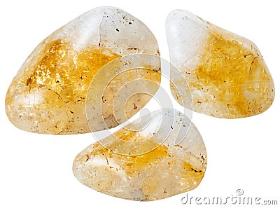 Three yellow citrine quartz gemstones isolated Stock Photo