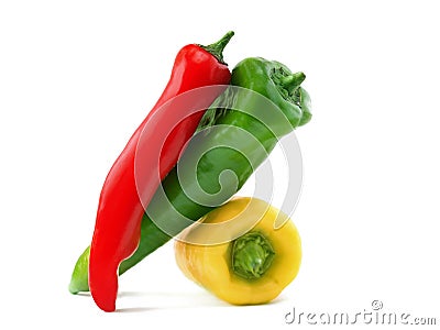 Three yellow red green chillies Stock Photo