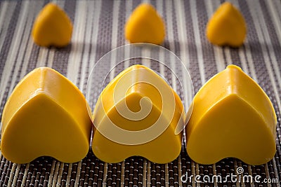 Three yellow soap hearts Stock Photo