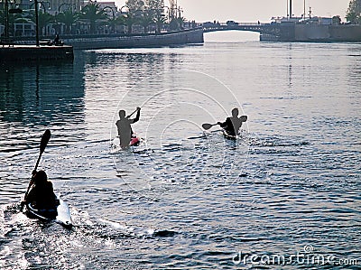 Three young athletes training on canoe Editorial Stock Photo