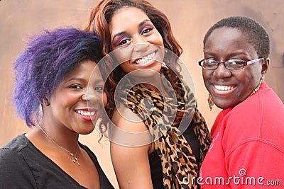 Three young black women together smiling Stock Photo