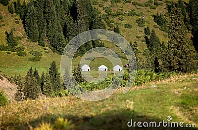 Three Yurt Nomad`s tent in mountains Stock Photo