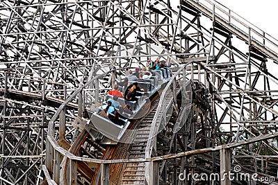 Thrill ride with wooden coaster Editorial Stock Photo