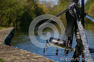 Thriller seeker`s jet pack for jet lev or jet levitation waits by the lakeside. Stock Photo