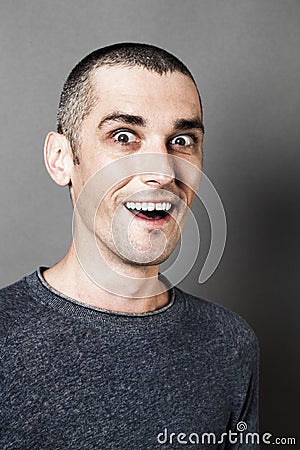 Thrilled man laughing to express his joy and amazement Stock Photo