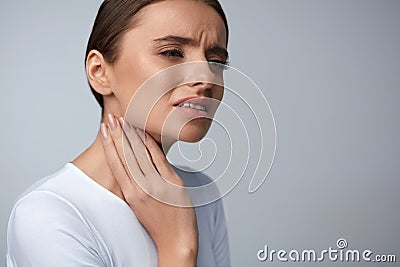 Throat Pain. Beautiful Woman Having Sore Throat, Painful Feeling Stock Photo