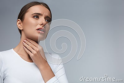 Throat Pain. Beautiful Woman Having Sore Throat, Painful Feeling Stock Photo