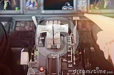 Throttle levers, ready to go. Jet airliner cockpit. Stock Photo
