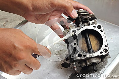 Throttle valve cleaning Stock Photo