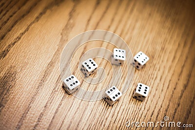 Throwing six dice and getting a perfect score ! Stock Photo