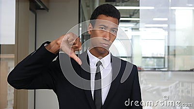 Thumb Down, Unsatisfied Black Businessman Stock Photo