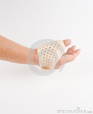 Thumb orthosis, medical support Stock Photo
