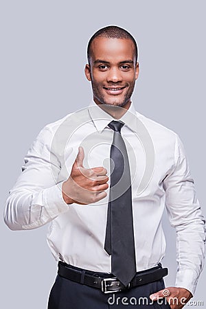 Thumb up for success! Stock Photo