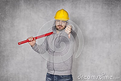 Thumbs down from manual worker Stock Photo