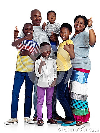 Thumbs up for family. Studio shot of an african family giving thumbs up signs, isolated on white. Stock Photo