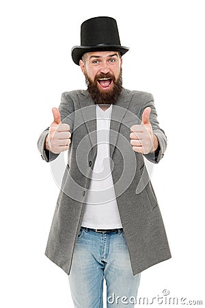 Thumbs up to retro. Bearded man wearing cylinder hat in retro style. Caucasian guy showing thumbs ups in retro tophat Stock Photo